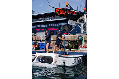 Alinghi Red Bull Racing base: Kai Lenny of the United States seen during the safety briefing